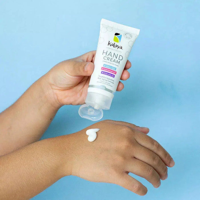 Application of Kalaya Hand Cream with Aloe Vera Coconut Oil and Marula Oil 60ml on hands